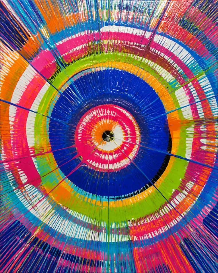 Colourful concentric spin painting with energetic paint trails